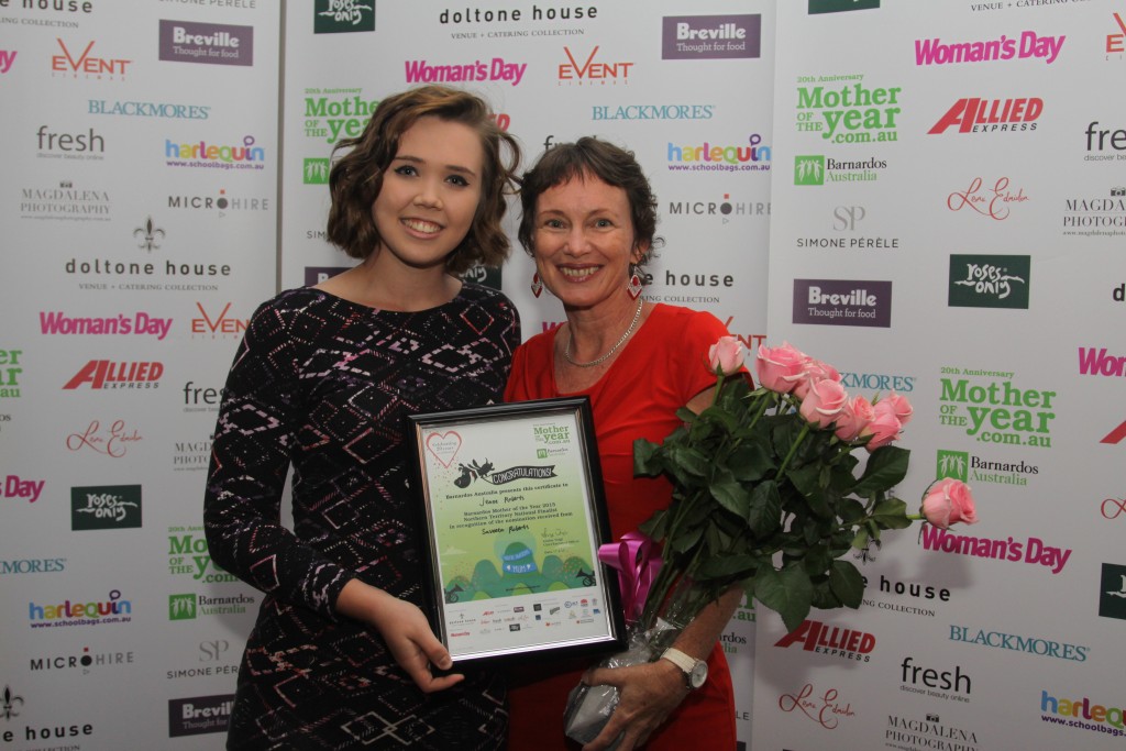 Jenne Roberts (with her daughter Saveeta) after winning the NT Mother of the Year Award. (Supplied photo)