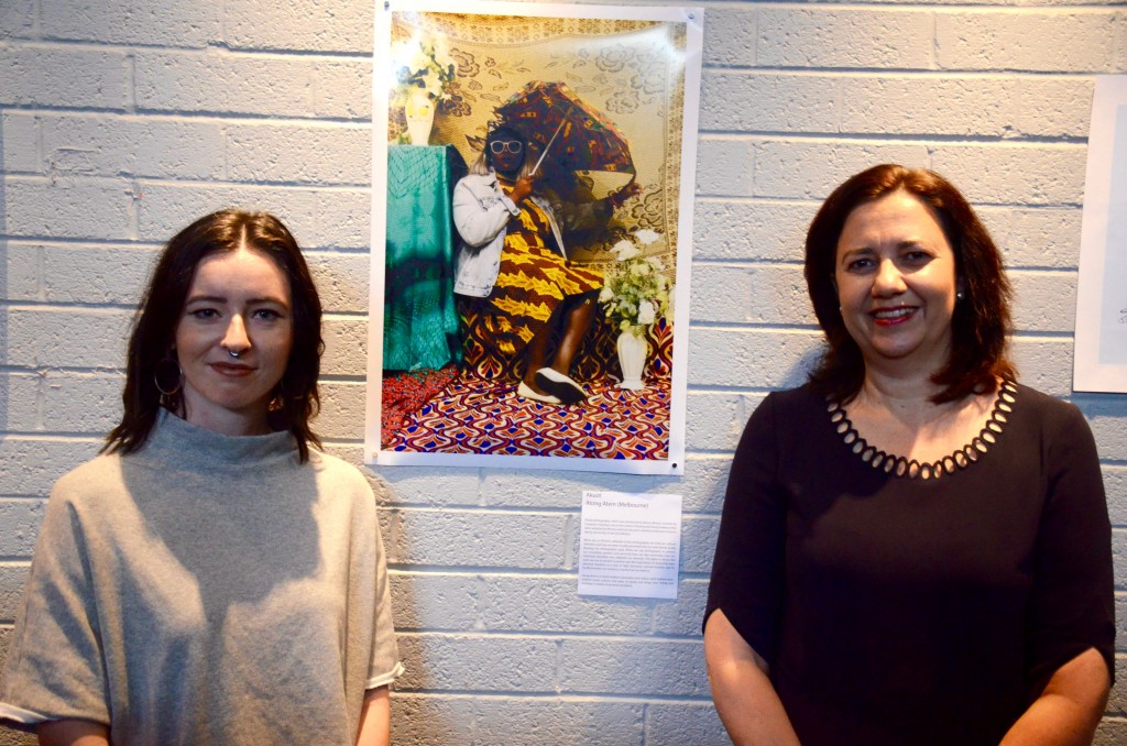 Brisbane Powerhouse Curator of Visual Art Alexandra Winters and Premier Annastasia Palaszczuk with Portrait Prize winning entry "Akout" by Atong Atem. (photo: David Alexander; Star Observer)