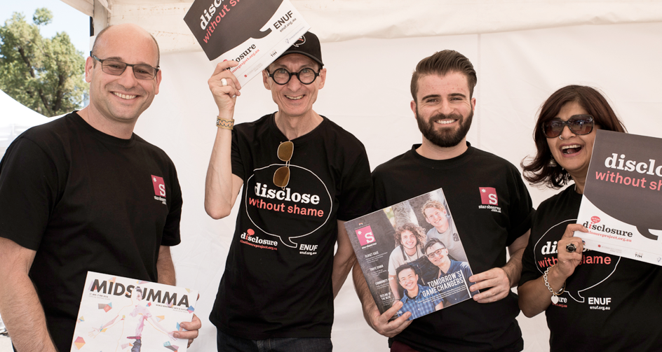 Star Observer Editor Elias Jahshan and CEO Daniel Bone (far left) working at Midsumma Carnival 2016 (PHOTO: Burke Photography; Star Observer)