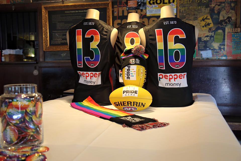 The St Kilda jumpers and football that will be used for the Pride Game with merchandise available to buy.