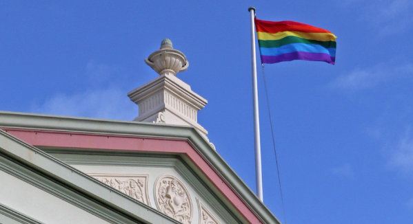 The rainbow flag flying atop Randwick Town Hall to celebrate Mardi Gras season (PHOTO: Benedict Brook; Star Observer)