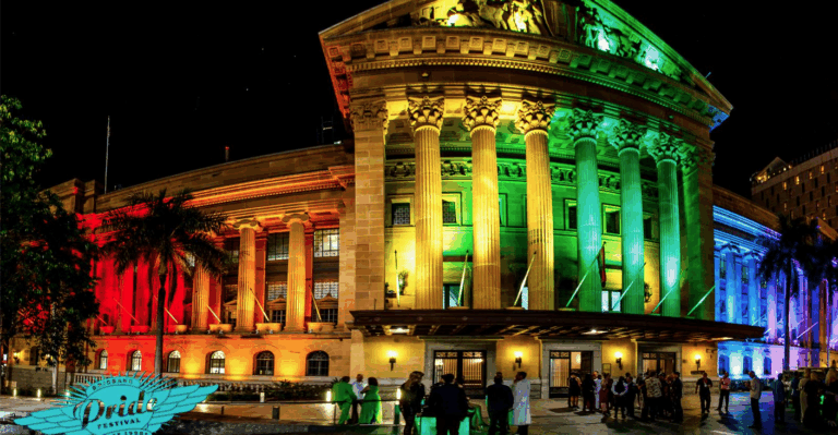 Brisbane's City Hall was lit up in rainbow colours for the annual Queen's Birthday Ball. (Image source: Facebook)