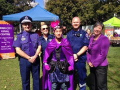 NSW police's Tony Crandall, representatives of NSW Ambulance Service, Wear It Purple's Peter Nguyen and Newtown state Greens MP Jenny Leong at a Wear It Purple event in Sydney's Hyde Park.