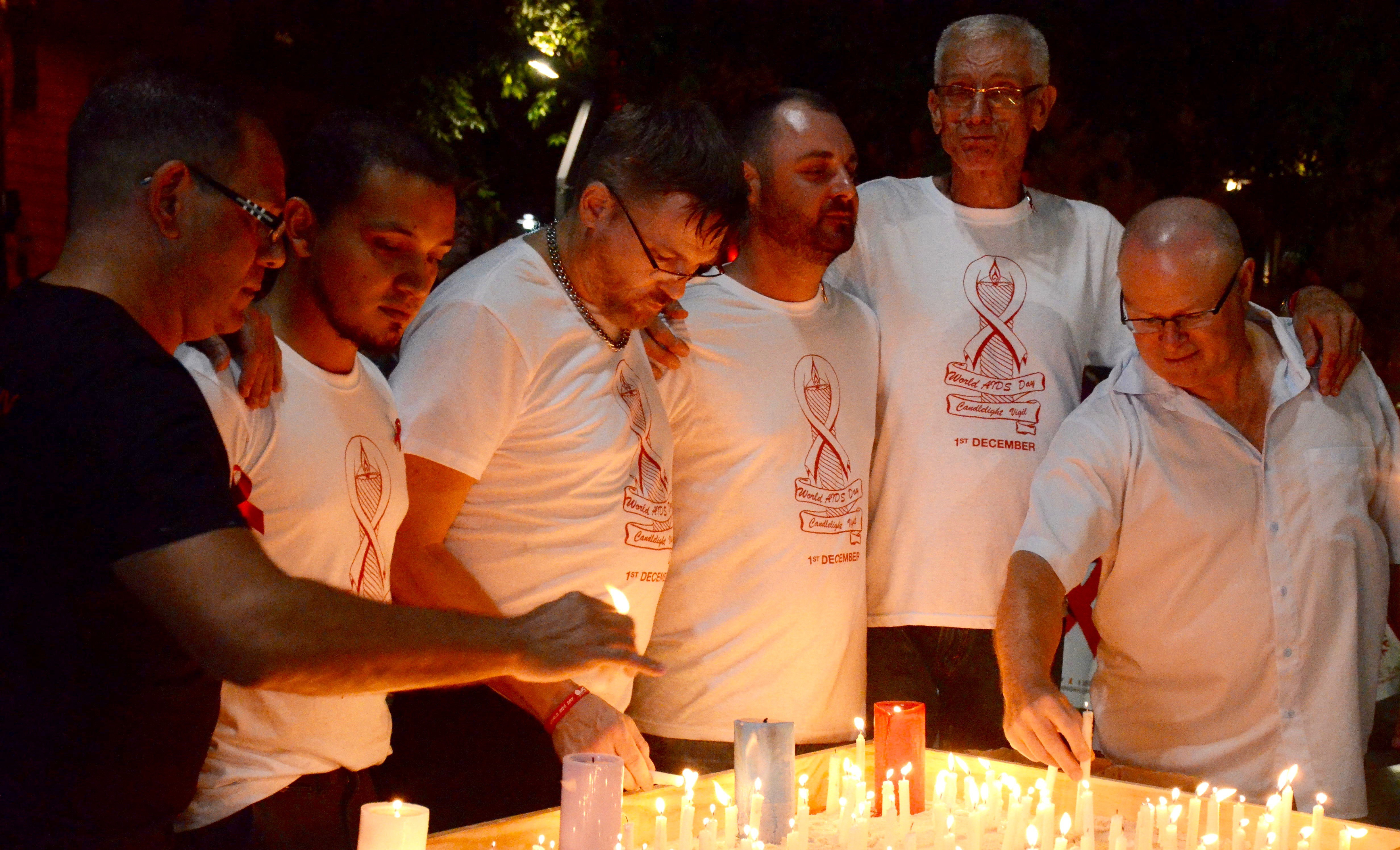 Moving vigils and HIV funding news marks World AIDS Day in Queensland