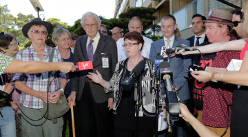 Members of the 78ers, the founders of the Sydney Gay and Lesbian Mardi Gras, address the media outside NSW Parliament following the apology. (PHOTO: Ann-Marie Calilhanna; Star Observer)