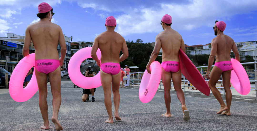 ACON Safe Sex pink condom promo @ Bondi Beach