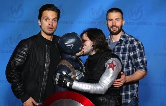 Gay couple pash in front of Captain America and Bucky