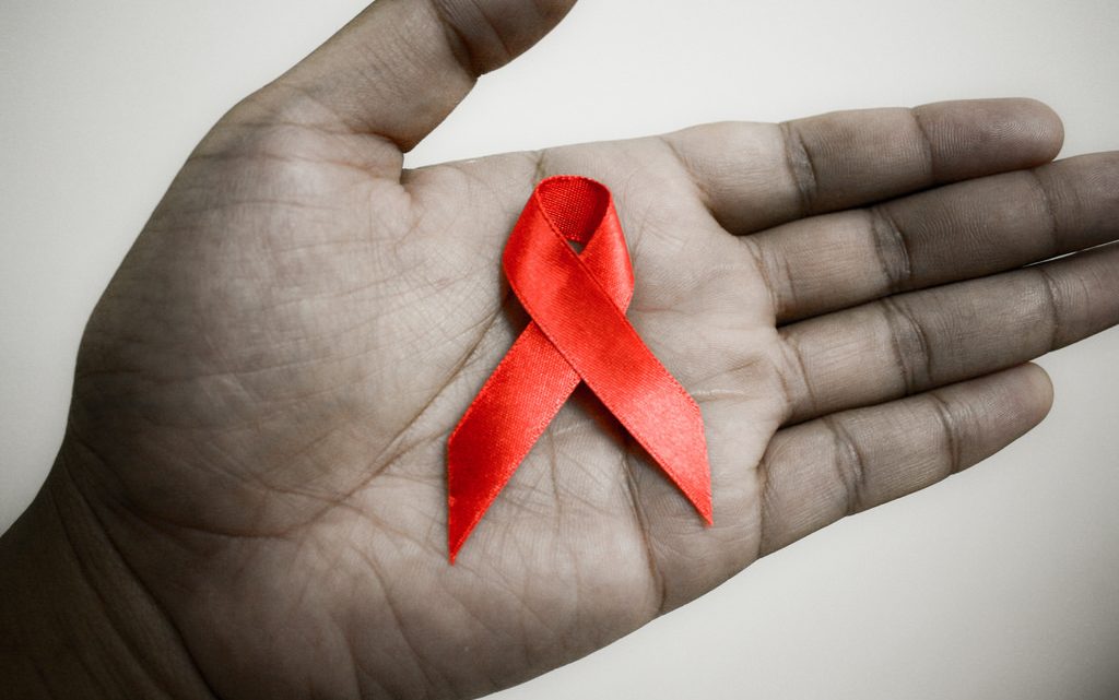 hiv self test memorials ribbon red
