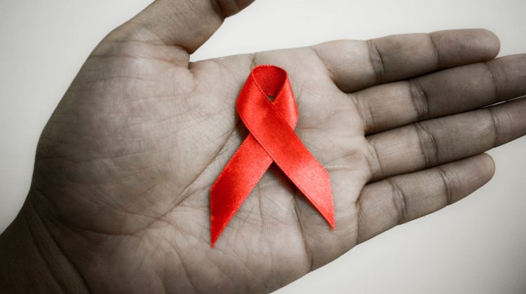 hiv self test memorials ribbon red