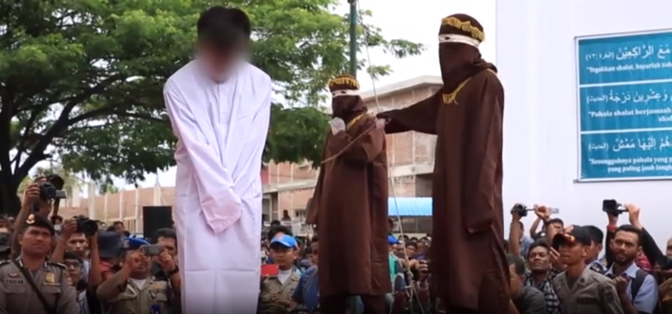 Indonesian men caned for gay sex while onlookers cheered