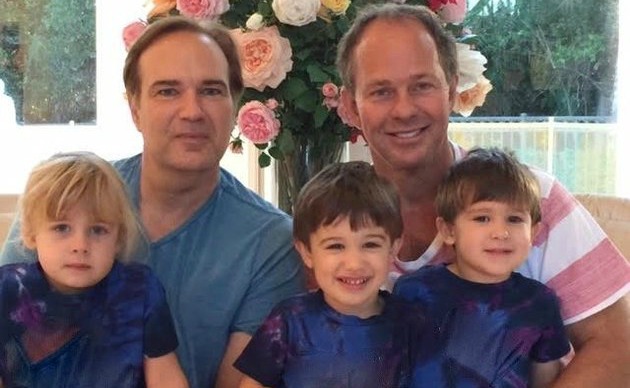 Airline denies boarding to family with gay dads