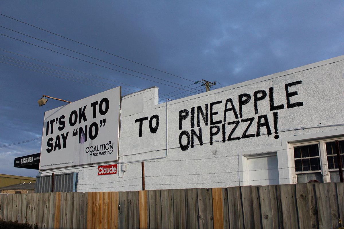 Pizza shop changes “vote no” billboard message