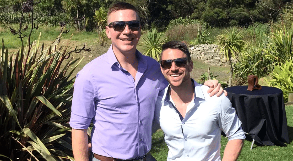 Gay couple that was sent homophobic flyers instead of wedding programs settles lawsuit