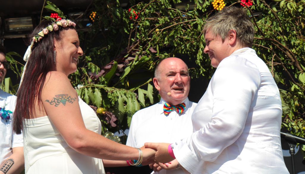 ‘If you’ve found the one don’t wait’: childhood sweethearts married at Pride