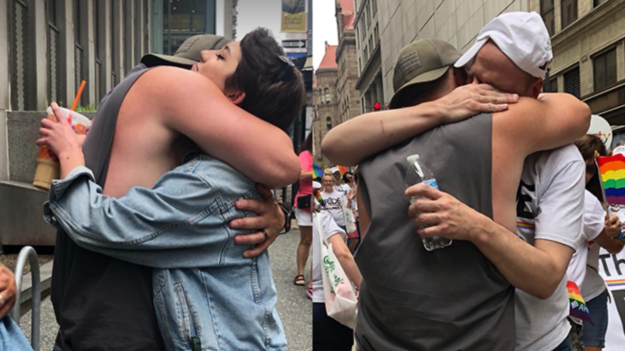Dad gives out hundreds of ‘free hugs’ at Pride parade