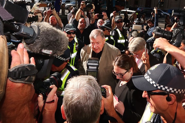 Cardinal George Pell walks free from prison