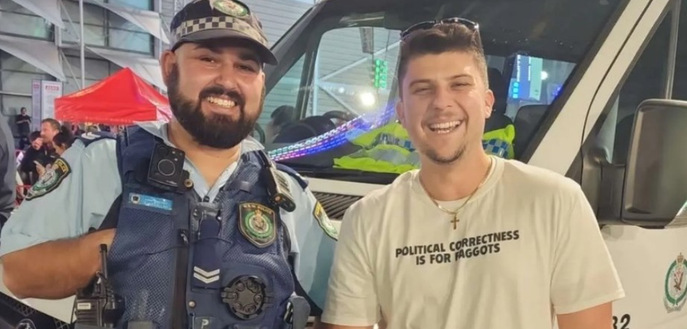 Man Wearing T-Shirt With Anti-Gay Slur Poses With NSW Police Officer At Sydney Easter Show
