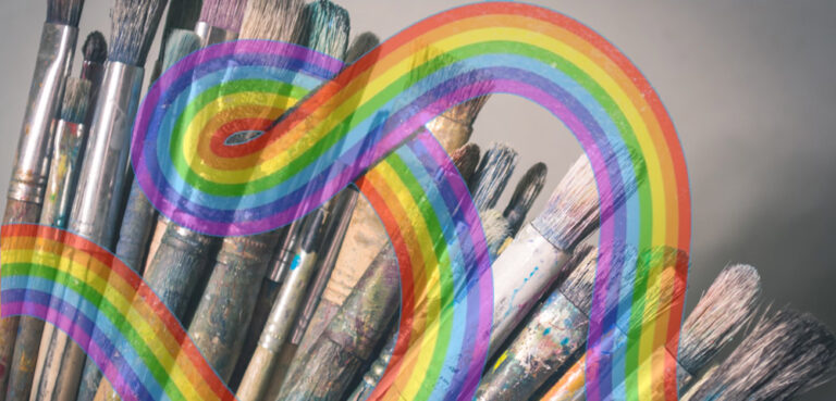A close-up image of used paintbrushes overlaid with the Bridge Queer Darebin graphic of a rainbow, swirling in and out of frame, almost forming a cursive letter 'n' or perhaps the top of a loopy letter 'p'